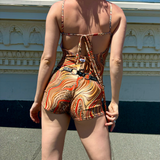 O-Ring Playsuit - Orange Cheetah Swirl